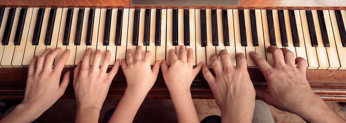 Beautiful hands playing piano