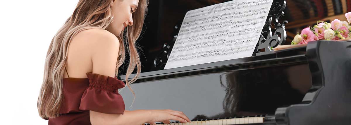 beautiful-woman-practicing-the-piano