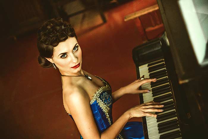 elegant woman on piano feat