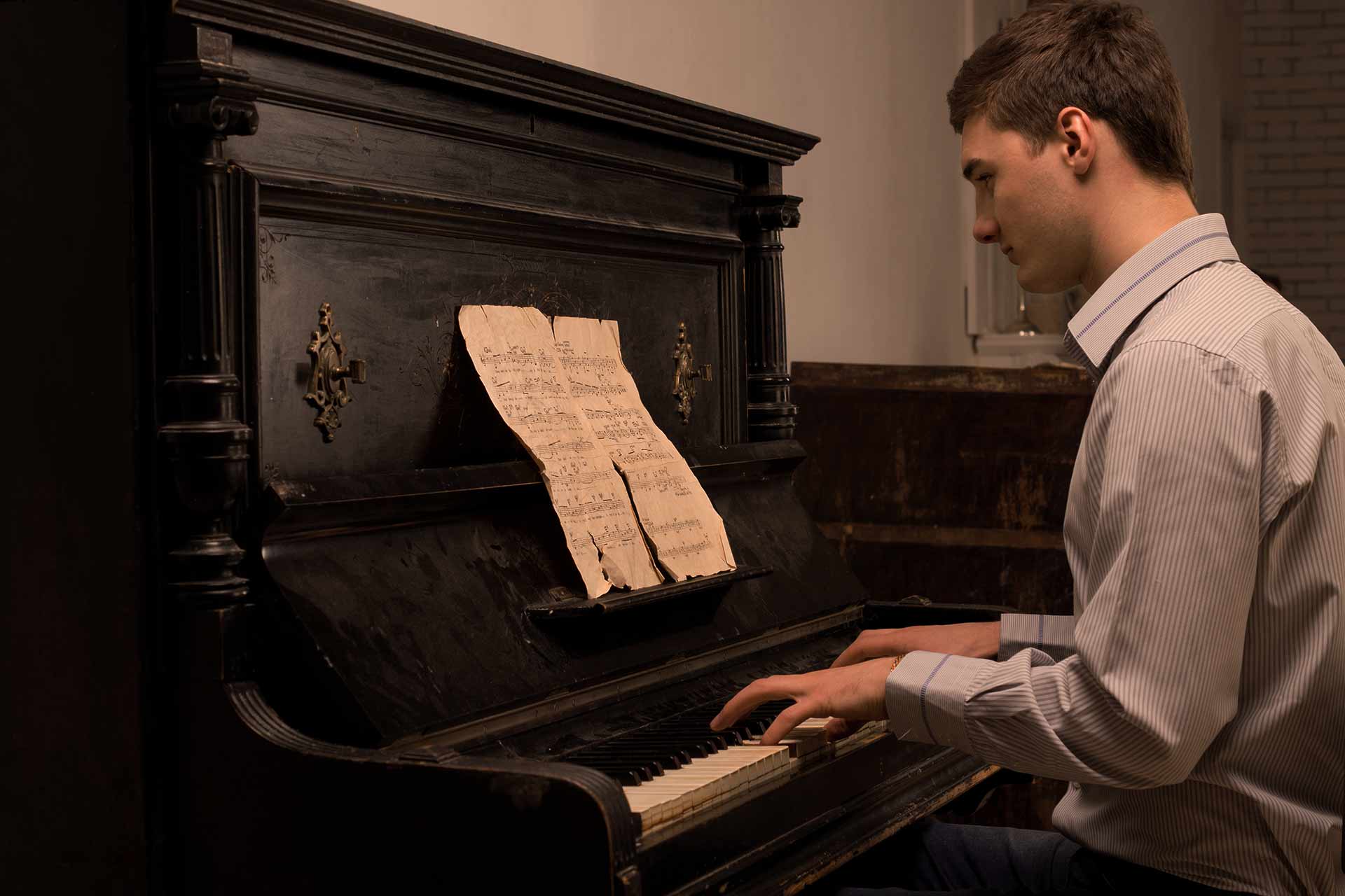 Gentleman reading a piano score