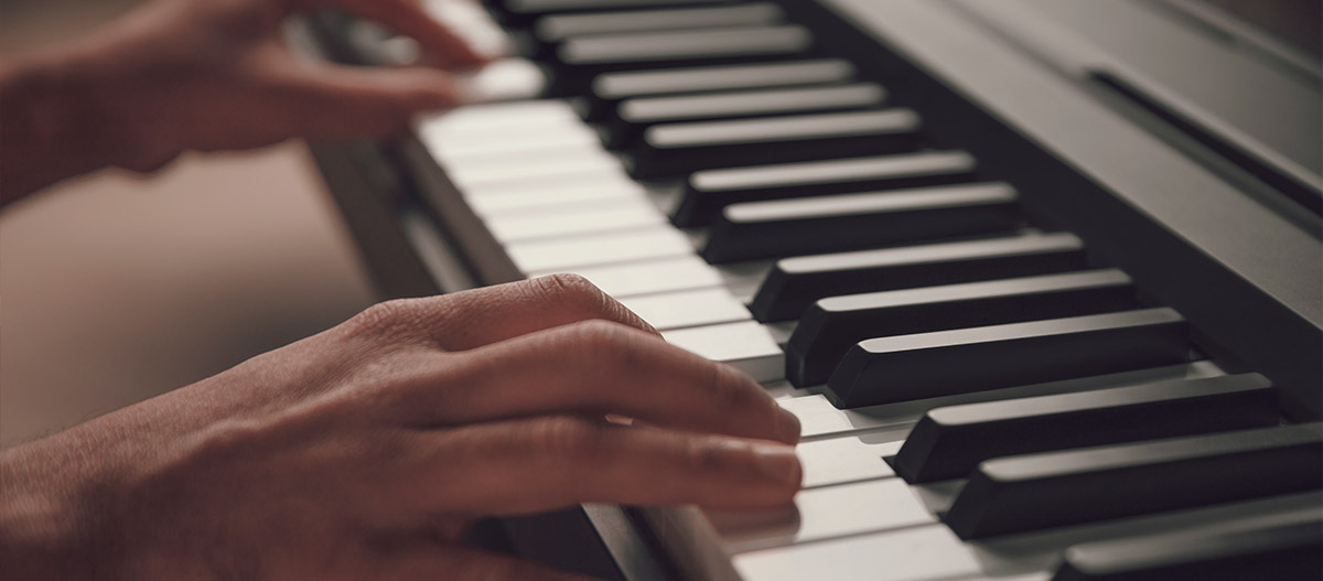 Hands on the piano