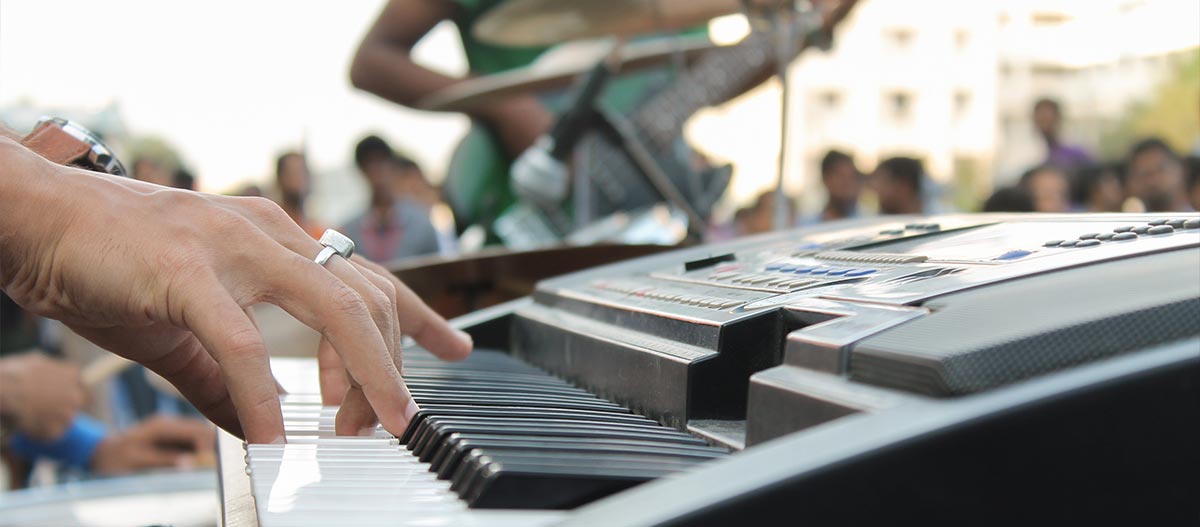 Hands playing piano