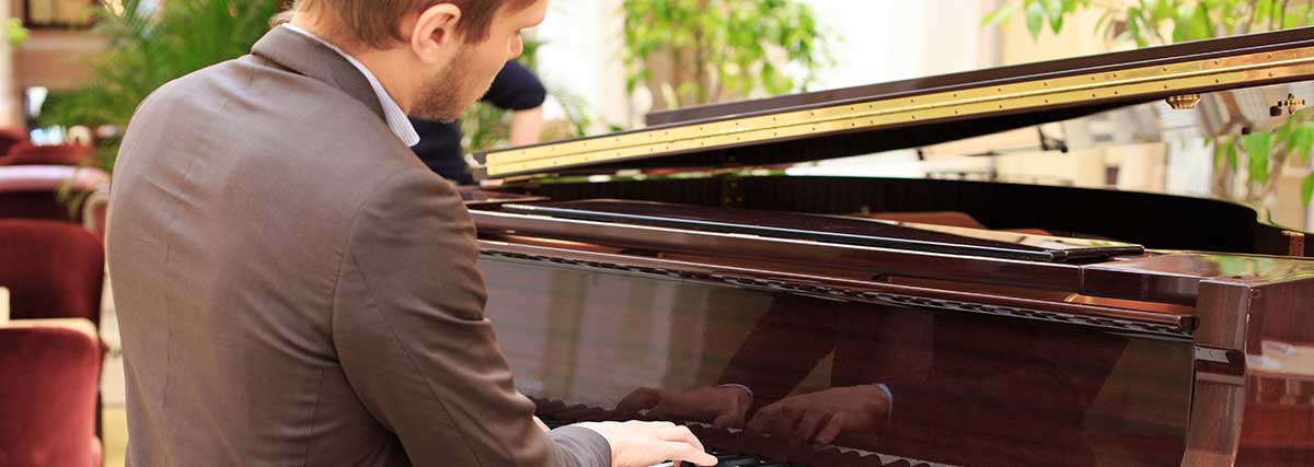man performing on the piano