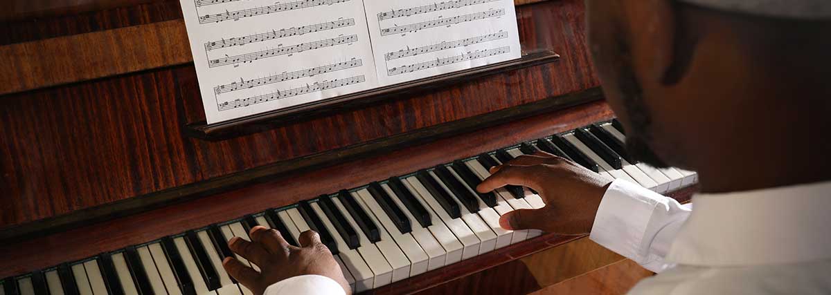 man performing on the piano