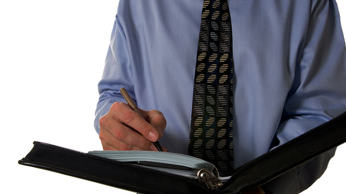 Man planning his diary