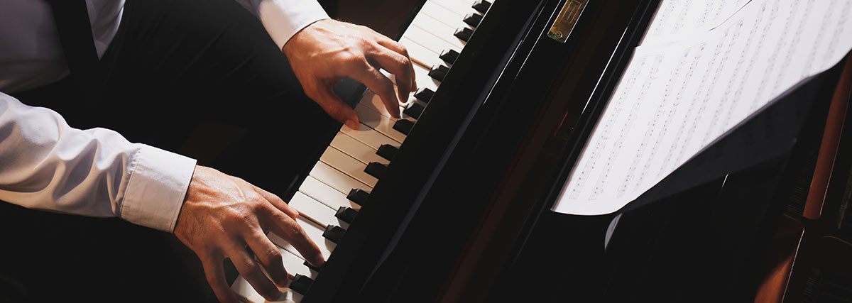 Man playing piano, view from above