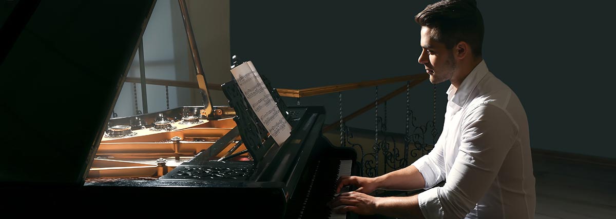 man-playing-the-piano