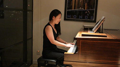 Meng performing at the Spring 2015 Secret agent concert at the London Piano Institute