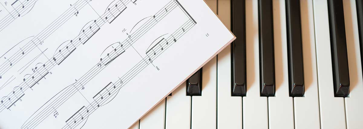 music sheet on the piano