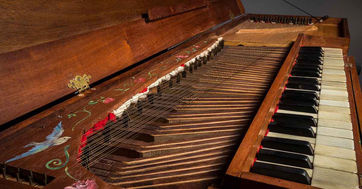 Old baroque clavichord strings and keyboard