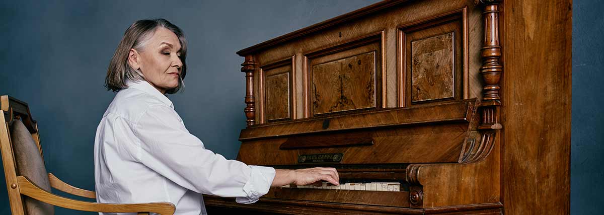 old lady playing the piano