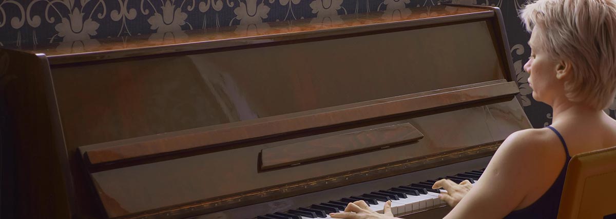 woman playing the piano