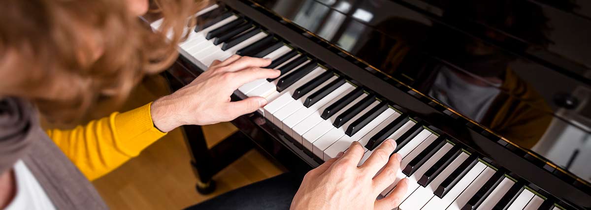woman playing the piano