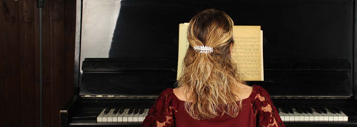 woman practising the piano